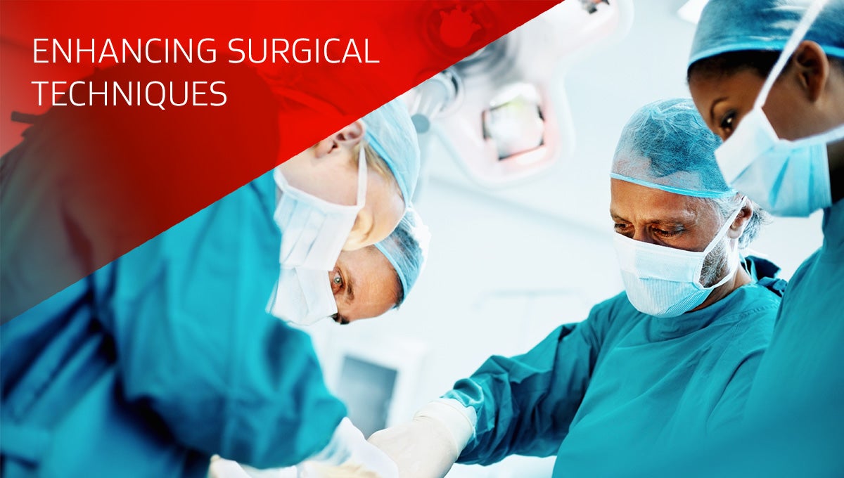 Four surgeons in operating room 