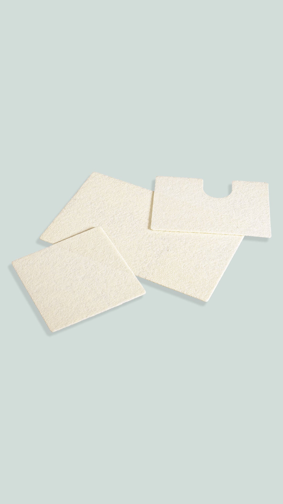 flat lay image of bio-a tissue product on light green background