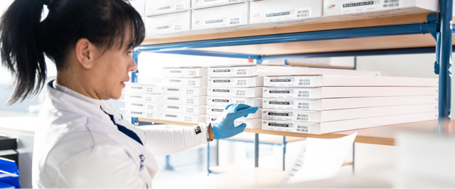 Female professional checking inventory
