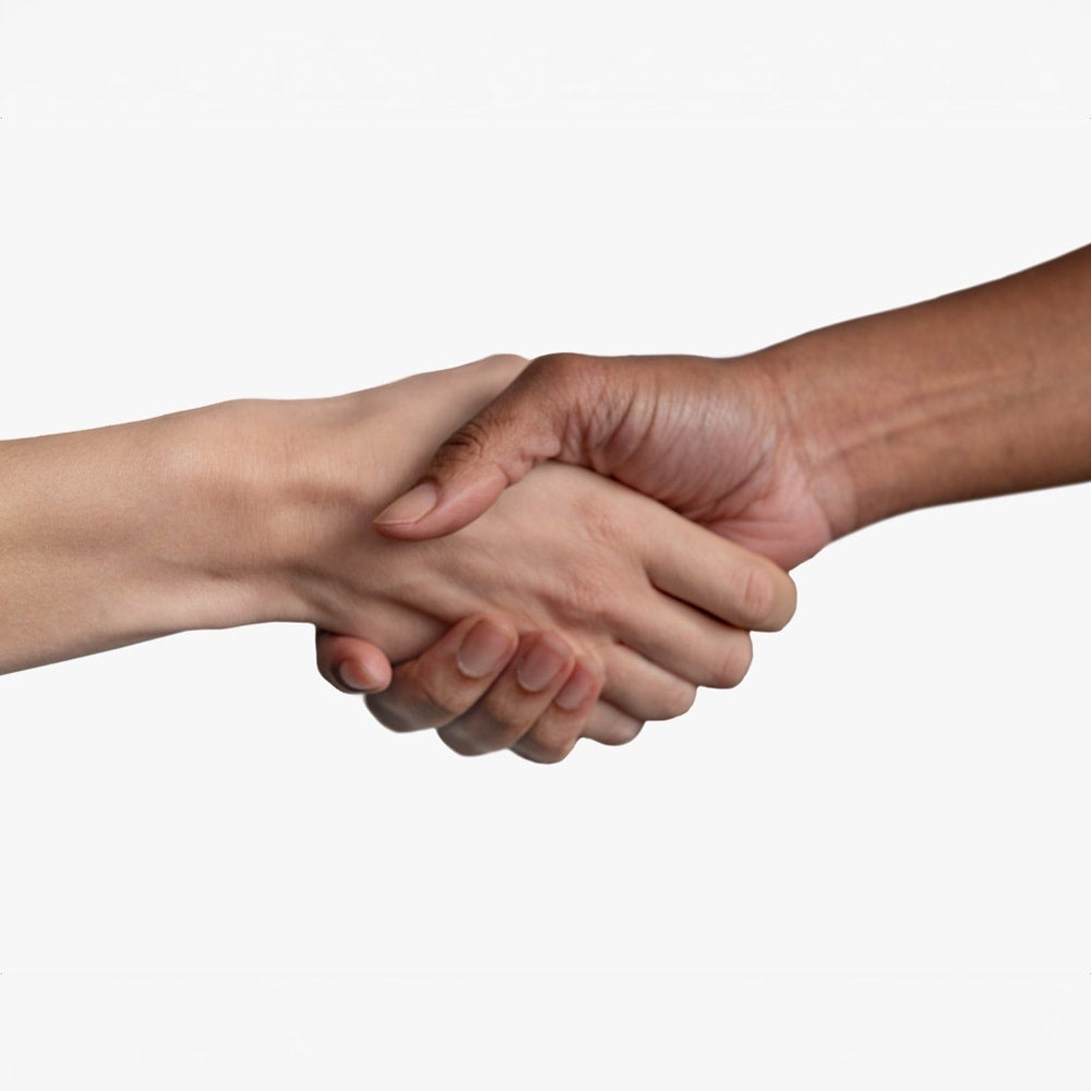 Two people shaking hands representing partnership and physician support in vascular treatment