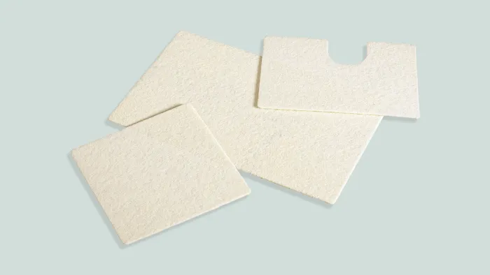 flat lay image of bio-a tissue product on light green background